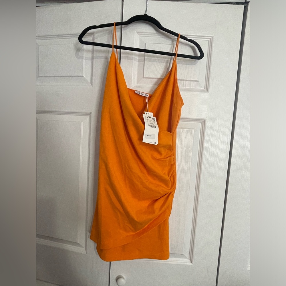 Zara Mini Dress with vneck and spaghetti straps. Ruching details at side